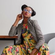 Featured image of a model sitting at a desk