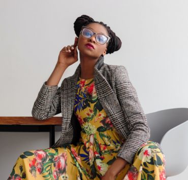 Featured image of a model sitting at a desk